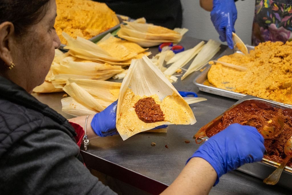 Woman making tamales