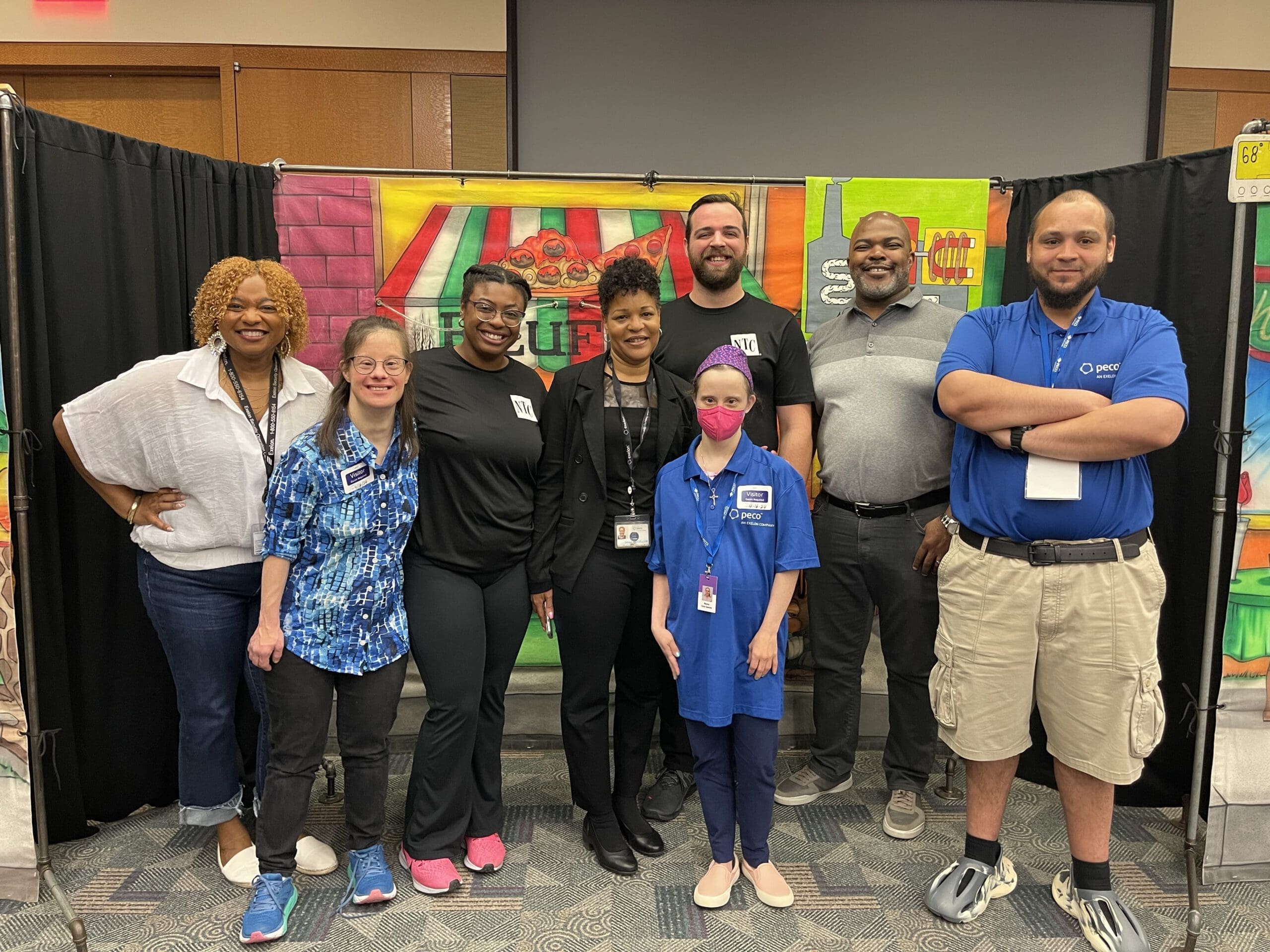 A group of people smiling for a photograph